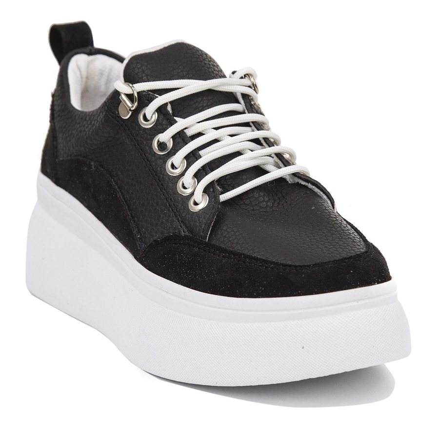 VOLTA Plataforma 60 na cor preto e branco, vista lateral.
